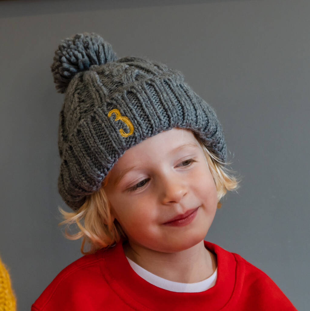 Embroidered store bobble hats