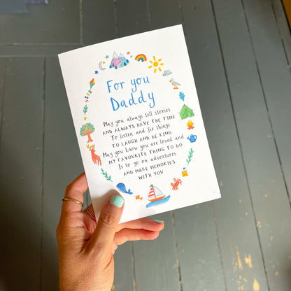 A hand holding a Father's Day card with the text 'for you daddy', a poem and watercolour illustrations